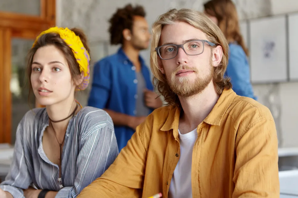 Couple seeking psychiatric support while discussing mood changes and relationship strain linked to bipolar disorder