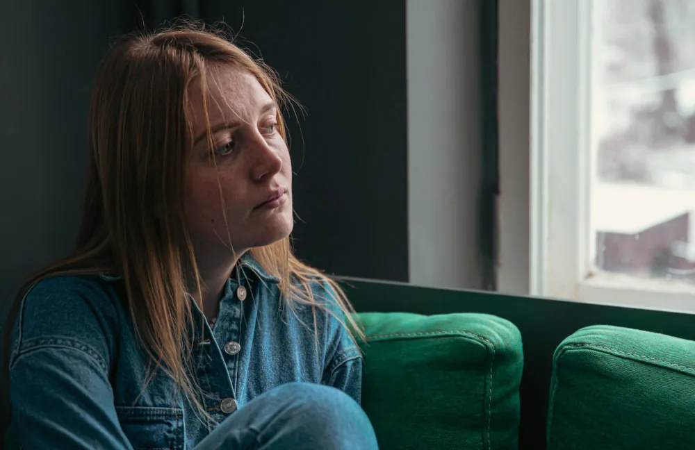 Woman experiencing isolation and reduced motivation associated with depression
