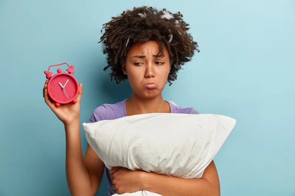 Woman struggling to begin the day while experiencing low energy and reduced motivation