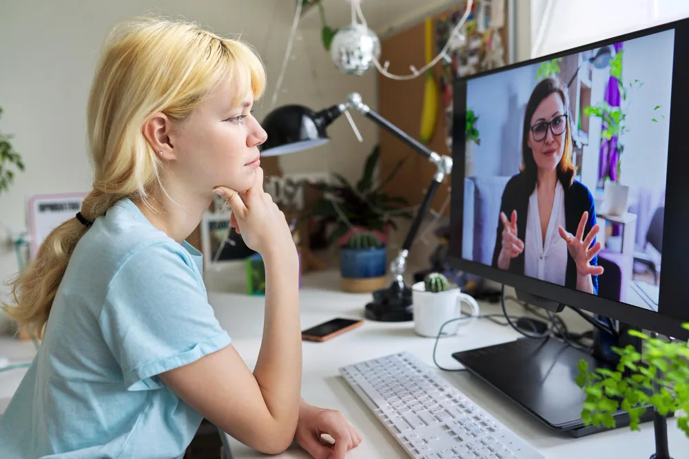 Patient completing an online wellness session that supports a personalized psychiatric care plan